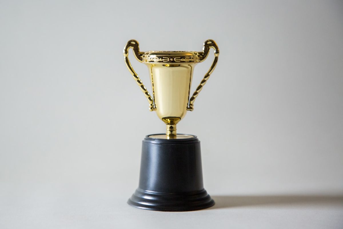 Gullpokal som symbol paa rekord og prestasjon